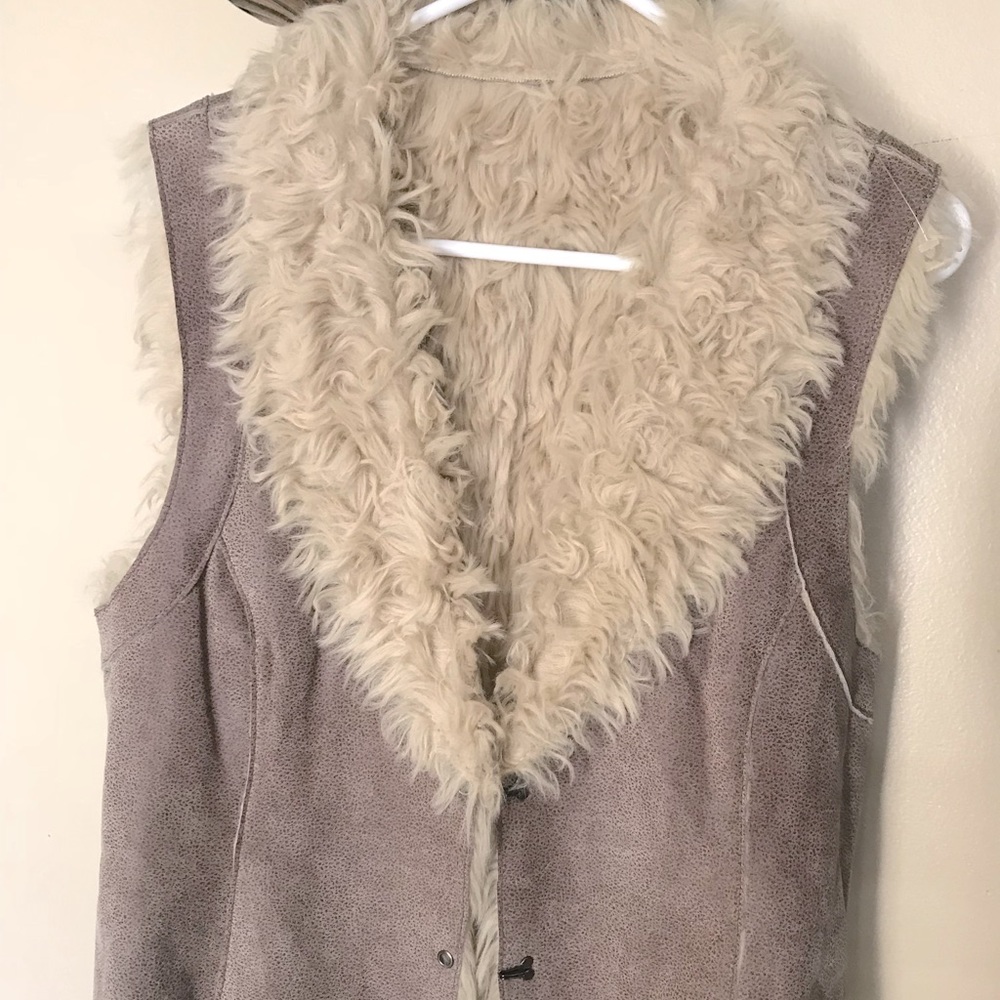 Suede vest lined with faux fur